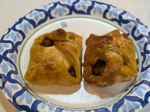 Savory hand pies plated for an Utsav & Adda event